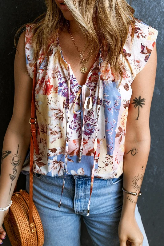 Bargain Bin Printed Tie Neck Cap Sleeve Blouse