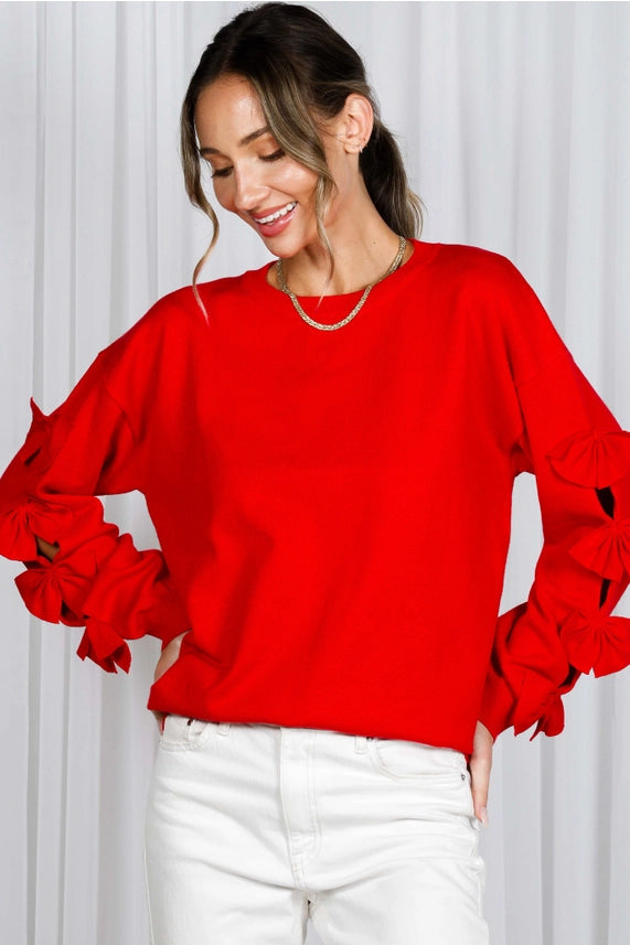 Weekend Specials to Snag Red sweater with bows on sleeve